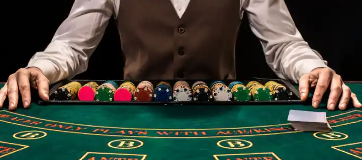 dealer at blackjack table 
