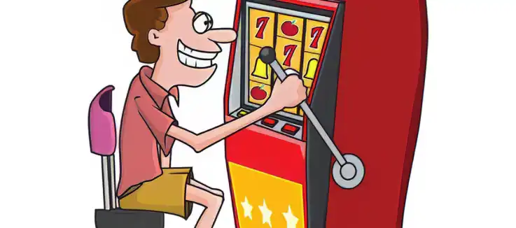 Guy playing on a slot machine  