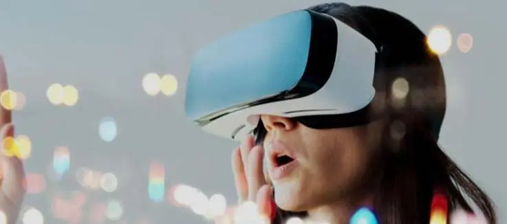 woman wearing and playing with a futuristic VR gaming headset